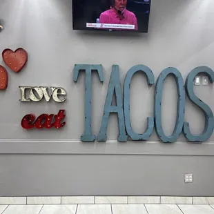 a tv mounted on the wall