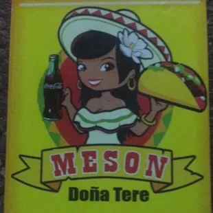 a mexican woman holding a taco