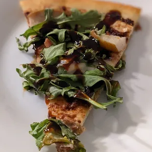 Slice of prosciutto pizza