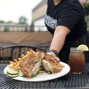 Grilled Turkey Apple Brie Sandwich: roasted turkey, green apples, brie cheese, spinach, mayo, cranberry wild rice bread...GRILLED.