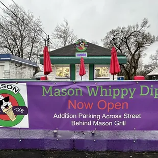 a sign for mason whippy dip now open