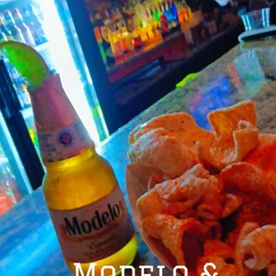 Happy Hour snack!! Chicharron and Modelo..