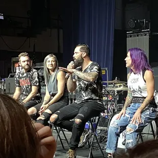 a group of people on stage