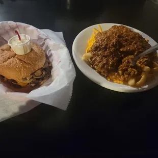 A perfectly cooked medium rare burger. Cheddar cheese, sautéed onions and mushrooms. The Chilli cheese fries are THE BEST.