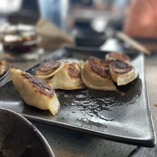 Pan Fried Beef and cheese dumplings