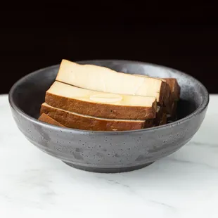 a bowl of sliced bread