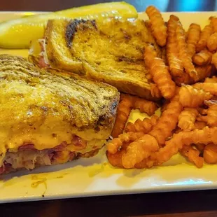 Ruben sandwich and sweet potato fries.