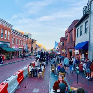 a busy street lined with people