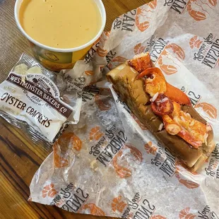 a cup of coffee and a sandwich