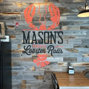 Logo on wall inside.