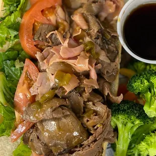 a plate of meat and vegetables