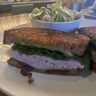 Smoked Turkey Club with side Caesar salad