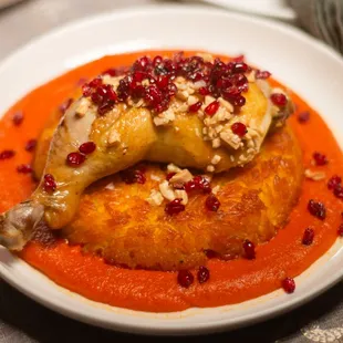 Safron chicken leg with apricot on crispy rice