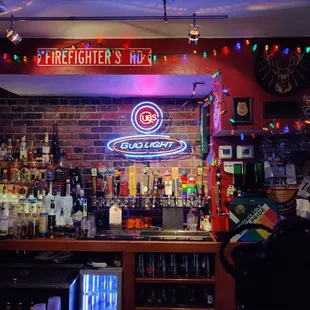 a bar with a neon sign