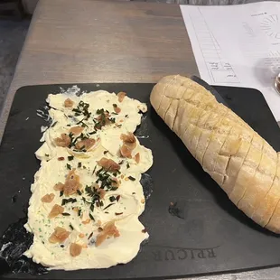 They have a delicious butter board served with warm yummy bread