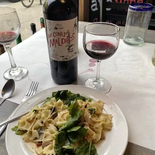 Bow Tie Pasta with chicken, spinach, mushroom in a chipotle butter sauce.