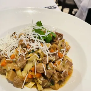 Fresh fettuccine with lamb and wild mushrooms.   Sauce was really good
