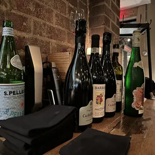 several bottles of wine on a table