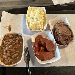 1/4 pound of both sausage and sliced brisket.