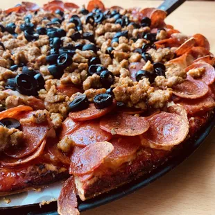 Large (14") thin crust double pepperoni, double sausage, and black olive.