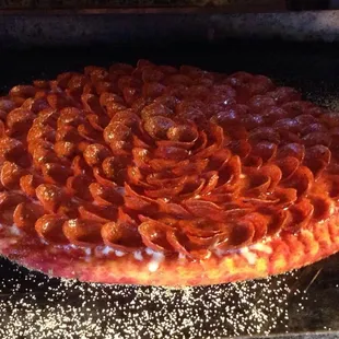 a pepperoni pizza in the oven
