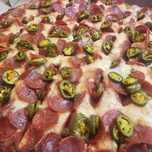 a pepperoni and jalapeno pizza