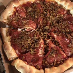 Deep dish Pepperoni Pizza w sausage... the pizza was gross! The dough did not taste done, could have been from all the toppings.