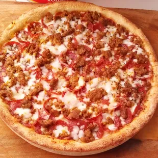 a pizza on a cutting board