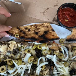 Nice burnt pizza ....ugh...this crust was rock hard and burnt. So pissed.