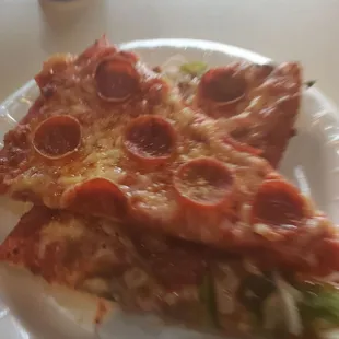 two slices of pepperoni pizza