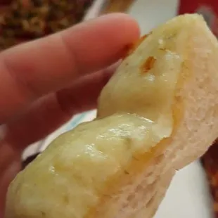 Under cooked garlic cheese bread