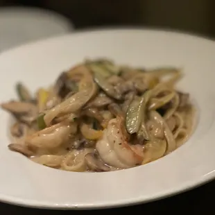 a plate of pasta and vegetables