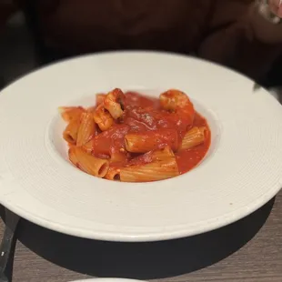 a plate of pasta with sauce