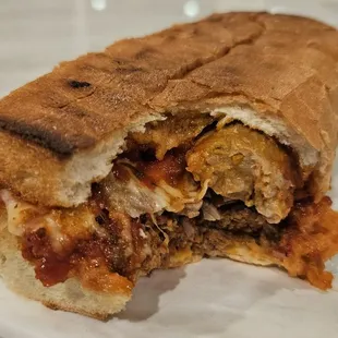 The #21 Massimo's Special hot sandwich. Meatballs, Italian sausage, thin sliced roast beef, tomato meat sauce, and melted cheese. Great!