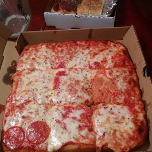 Burnt 'pepperoni pizza' and breadsticks...