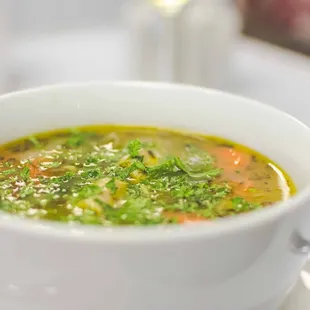 a bowl of soup on a plate