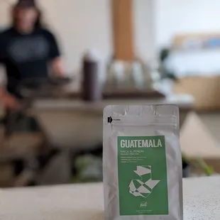 a bag of guatemalan coffee on a table