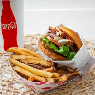 a basket of fries and a coke