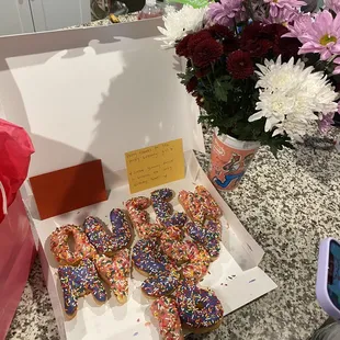 a dozen donuts in a box