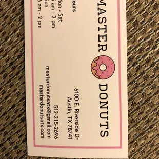 a business card with a donut on it