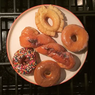 Assorted donuts (plating not included). The top sour cream old fashioned cake donut was the winner, but ALL were delicious.
