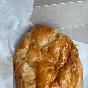 a pastry on a piece of wax paper