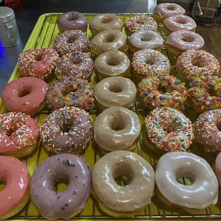 a variety of doughnuts with sprinkles