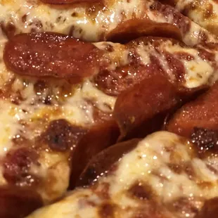 a slice of pepperoni pizza