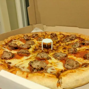 a pizza in a pizza box