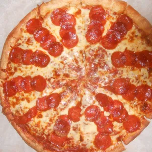48 slices of stacked pepperoni. While it looks completely baked on the outside, the dough inside was still underdone.