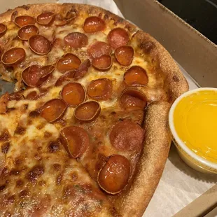 Cap n char spicy pepperoni pizza with garlic butter sauce.