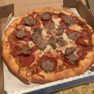 a pepperoni and sausage pizza
