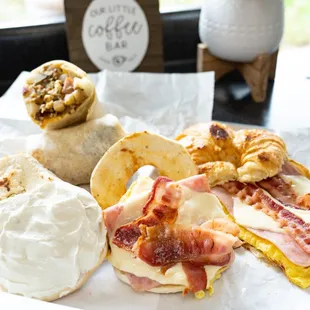 Some breakfast items we serve Monday-Saturday! Breakfast burritos, croissant sandwiches, and breakfast sandwiches.