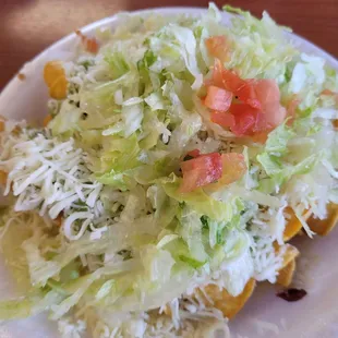 5 rolled shredded beef tacos